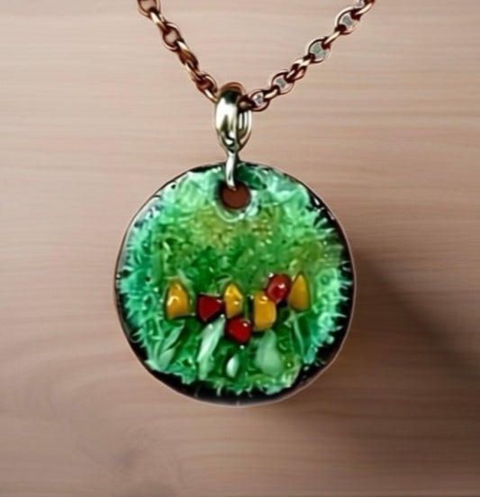 Necklace with a round pendant featuring green, red, and yellow color flowers on a beige background