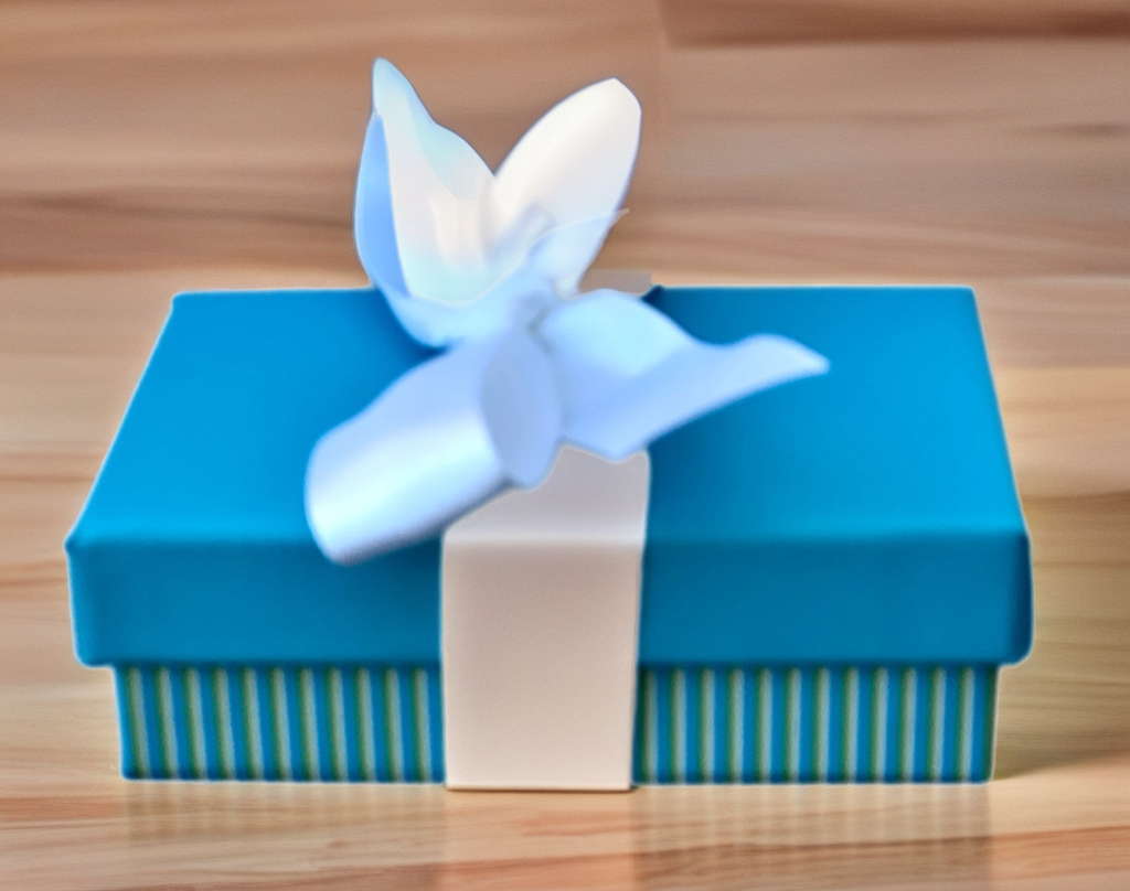 Blue gift box with a white bow on a wooden surface