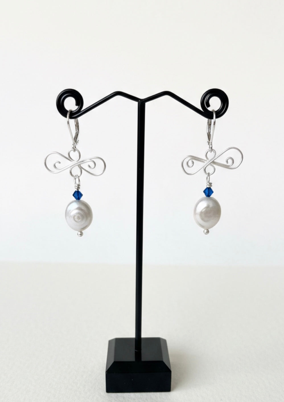 silver and pearl earrings hanging