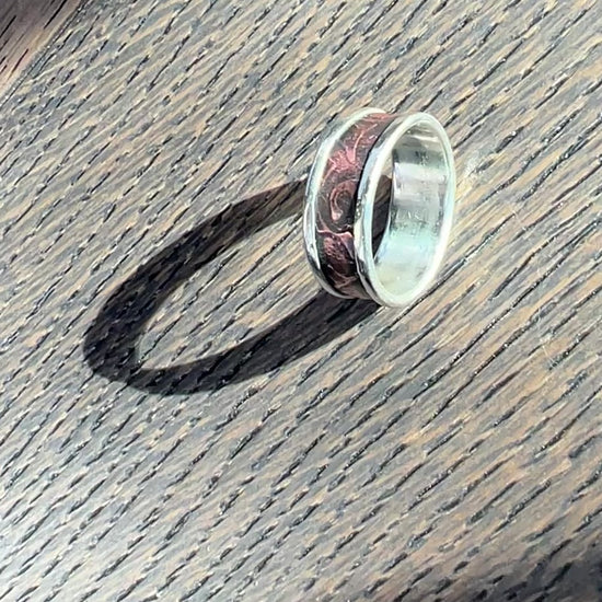 wrapped copper and silver ring video showing different angles of the ring